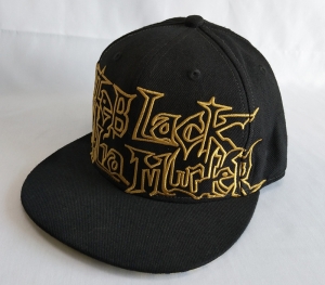 Fitted cap snapback cap